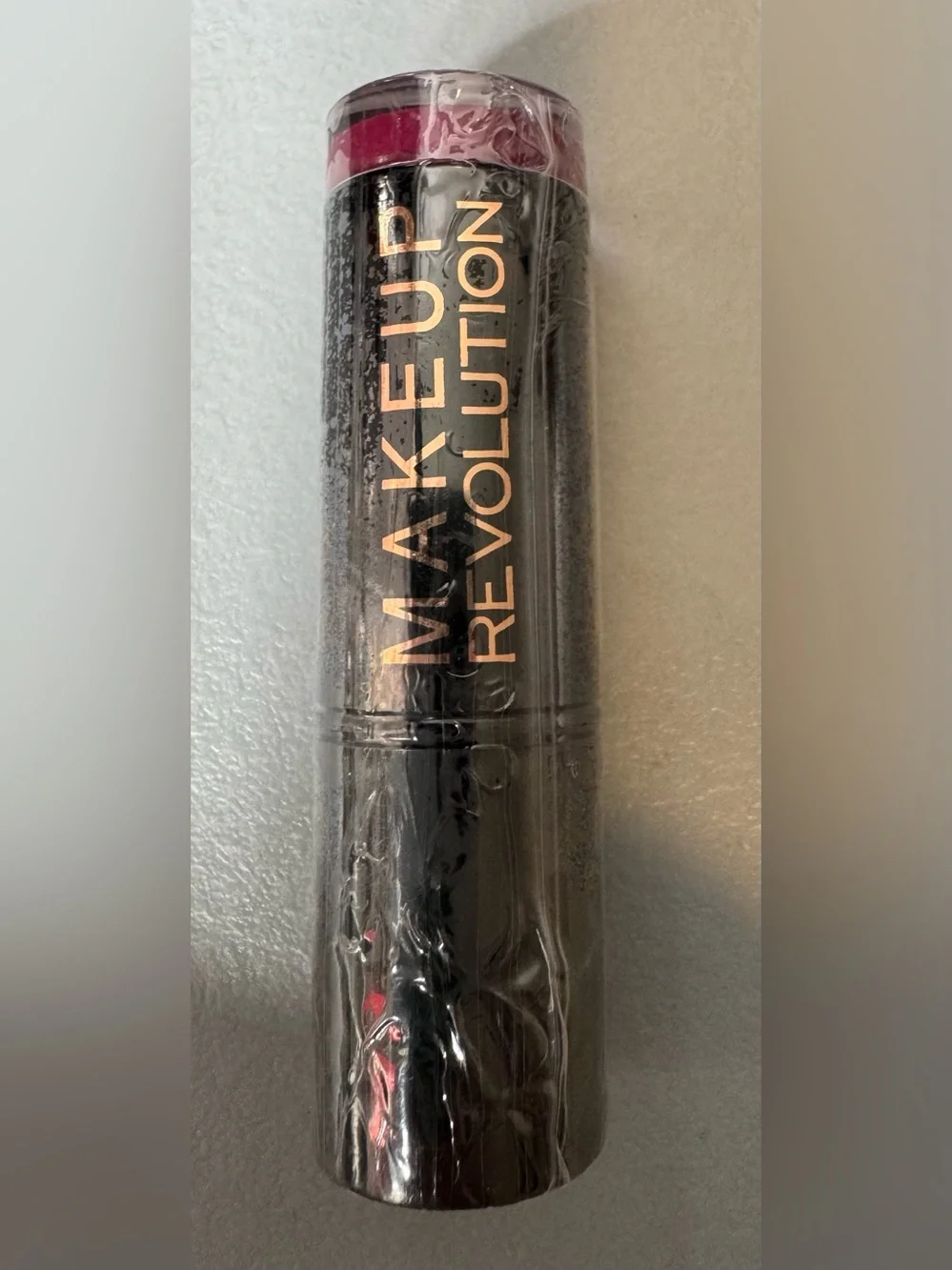 Makeup Revolution Lipstick in rebel with cause with - Deep Fuchsia
